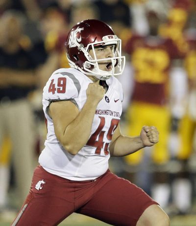 Washington State kicker Andrew Furney celebrates after kicking the winning field goal during the fourth quarter of Saturday's game in Los Angeles. (Chris Carlson / Associated Press)