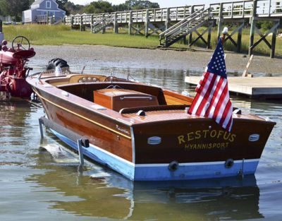 In this undated file photo provided by Guernsey’s, is John F. Kennedy's speedboat, Restofus. Hot memorabilia with a Cold War theme, including property of the late President John F. Kennedy and CIA pilot Francis Gary Powers, was being featured at an auction in New York City on Saturday, Oct. 7, 2017. (Associated Press)