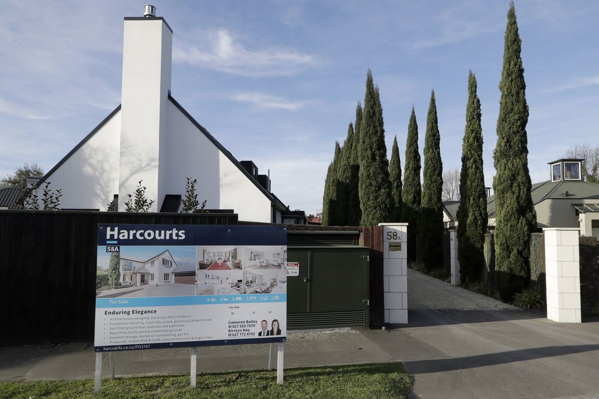 FILE - In this Aug. 13, 2018, file photo a house is pictured for sale in Christchurch, New Zealand. New Zealand