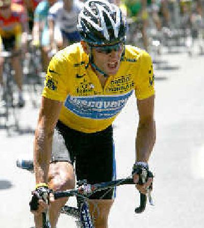 
Lance Armstrong is well on his way to his seventh consecutive Tour de France title. 
 (Associated Press / The Spokesman-Review)