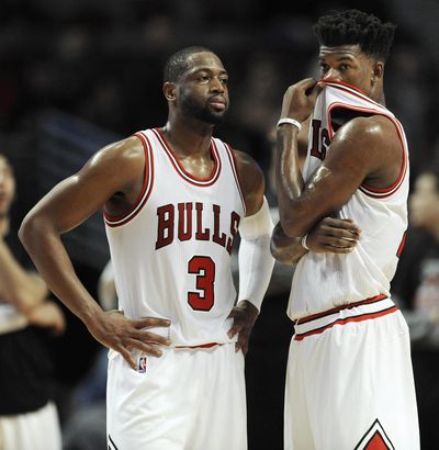 Chicago Bulls’ Dwyane Wade, left, and Jimmy Butler will be part of the NBA’s quintupleheader on Christmas Day against San Antonio. (Paul Beaty / Associated Press)