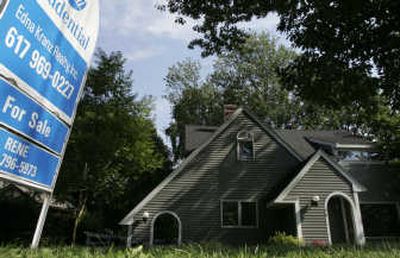 
A house for sale is shown Monday in Newton, Mass. Sales of existing homes dropped in May for the third month in a row.Associated Press
 (Associated Press / The Spokesman-Review)
