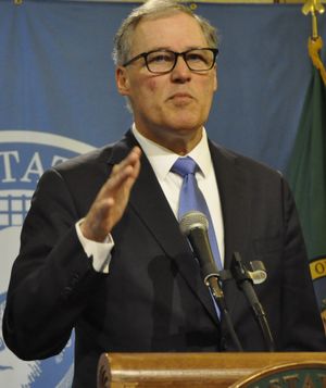 OLYMPIA -- Gov. Jay Inslee answers questions at a press conference after signing the supplemental transportation bill. (Jim Camden/The Spokesman-Review)