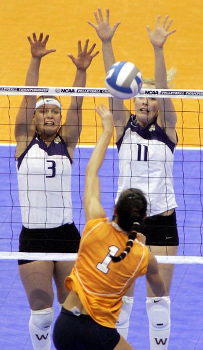 
Washington's Courtney Thompson, left, and Darla Myhre defend Tennessee's Yuliya Stoyanova during semifinal match on Thursday. 
 (Associated Press / The Spokesman-Review)