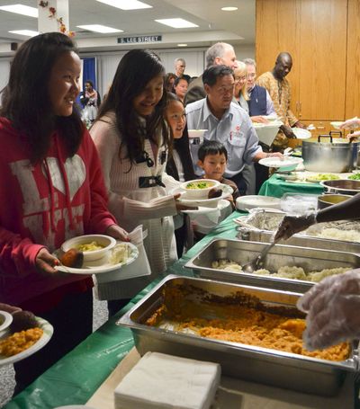 The Refugees’ Harvest Project celebrated the end of harvest with an international buffet at East Central Community Center on Saturday.