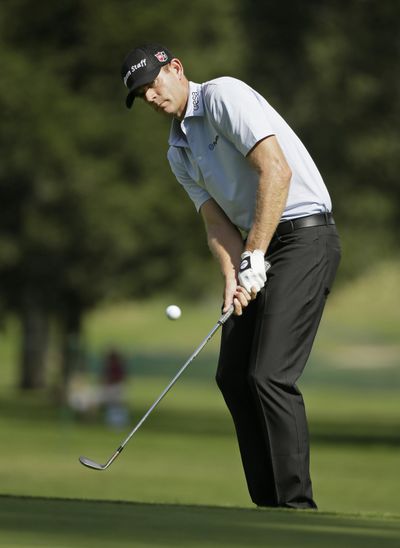 Brendan Steele chips the ball onto the ninth green of the Silverado Resort North Course on Thursday. (Eric Risberg / AP)