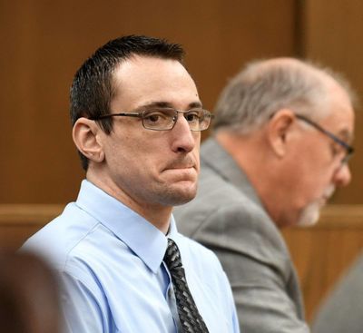 In this photo taken in November, Daniel Alldrin of Orofino watches the jury in the 2nd District courtroom at Lewiston where jurors reported to Judge Fred Gibler that they could not reach a verdict. Defense attorney James Seibe is in the background. (Barry Kough / Lewiston Tribune)