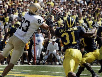 
Notre Dame's Jeff Samardzija (83) snags a TD pass. 
 (Associated Press / The Spokesman-Review)