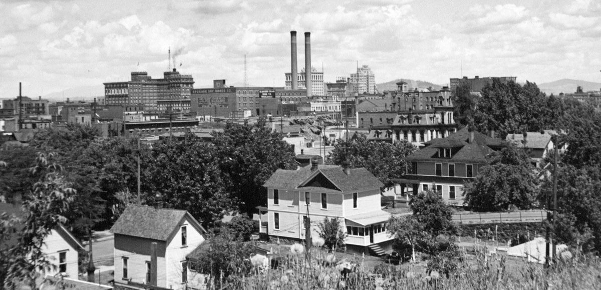 1930s: This image by an unknown photographer looks northeast from near Fifth Avenue and Jefferson Street and shows Spokane’s skyline.