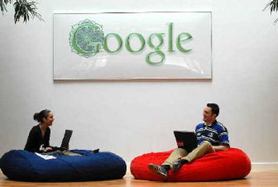 
Google employees Konstatina Stoyanosa, left, and Alex Torres enjoy a relaxed working atmosphere at their Dublin, Ireland, office.
 (Associated Press / The Spokesman-Review)
