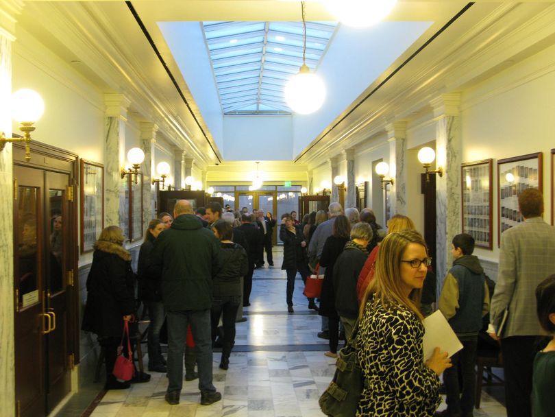 People line up in Capitol hallway on Friday morning for public hearing on health and welfare issues, including the health insurance coverage gap (Betsy Z. Russell)