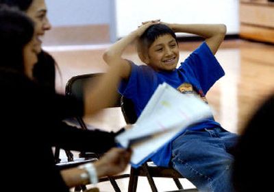 
Armondo Garcia, sixth-grader from Coeur d'Alene Tribal School, listens as his play is being read by actors from Native Voices at the Autry School of Theater from San Diego State University. The students have been working with mentors from University of Idaho to write short one-act plays.
 (Kathy Plonka / The Spokesman-Review)