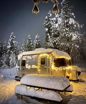 Ready to embrace winter camping season? We've got some advice on staying warm and cozy. (Airstream)
