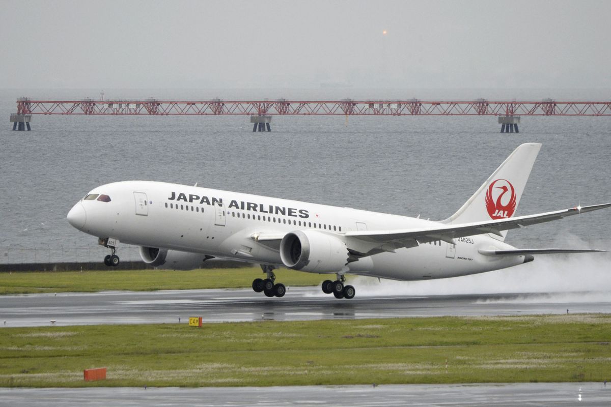 A Japan Airlines Boeing 787 aircraft takes off on a test flight from Haneda Airport in Tokyo on Thursday. Despite the Dreamliner’s grounding earlier this year, Boeing remains upbeat – and highly profitable – as the 787 returns to the air. (Associated Press)