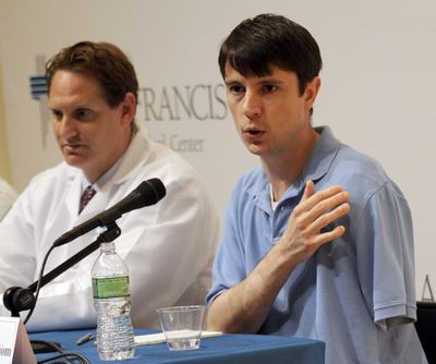 Jonathan Metz speaks at a news conference at St. Francis Hospital in Hartford, Conn., Tuesday, June 15, 2010. Metz had his arm stuck in his furnace boiler for about 12 hours when he asked himself 