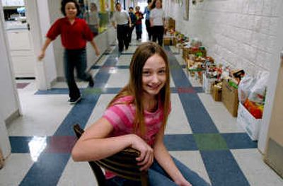 
Skyway fifth-grader Ashlynn Wigen excels at reading and loves to help out whenever she can. 
 (Kathy Plonka / The Spokesman-Review)