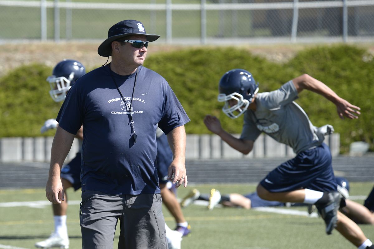 Gonzaga Prep coach Dave McKenna conducts practice on Aug. 17, 2016, at the school. McKenna will be inducted into the state coaches association hall of fame on May 17. (JESSE TINSLEY)