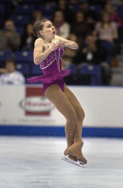 
Chrissy Hughes takes flight during the Junior Ladies free skate. She skated a clean program and finished sixth.  
 (Brian Plonka / The Spokesman-Review)