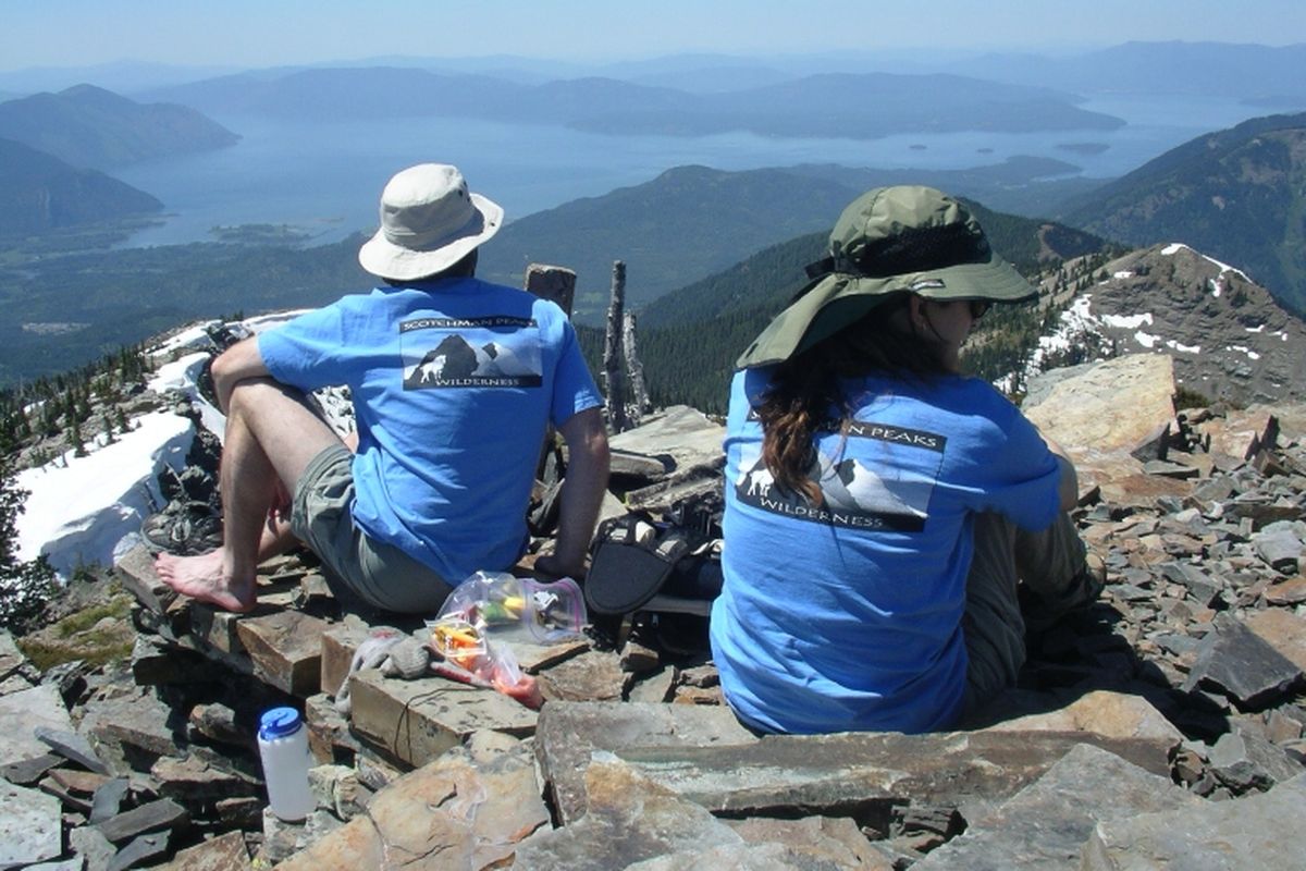 A pair of Friends of Scotchman Peaks Wilderness pause for lunch on Scotchman Peak above Lake Pend Oreille in Bonner County, Idaho. Senator Jim Risch of Idaho introduced legislation to designate the area as Wilderness in 2016.  (Friends of Scotchman Peaks Wilderness)