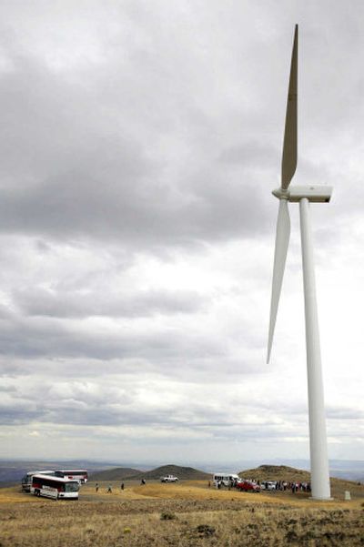  Visitors view a massive wind turbine at the Wild Horse Wind Power Project near Vantage, Wash., in this July 2006 file photo.
 (Associated Press / The Spokesman-Review)