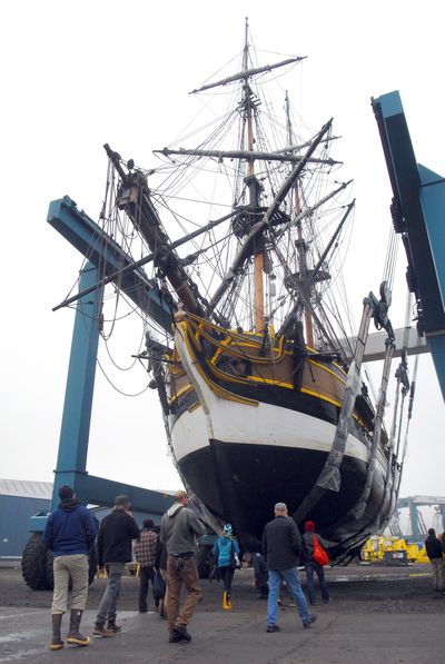 No damage found: Crew members of the tall ship the Lady Washington approach its keel in Port Angeles, Wash., on Saturday for hull inspection. The U.S. Coast Guard called for the inspection after the 112-foot ship ran aground Thursday night at the entrance to the marina in Westport, Wash. Crews were guiding the ship into the Westport Marina to fuel up for the journey south when the ship became stuck in a layer of silt. The inspection found no damage, and the Lady Washington was later returned to the water. (Associated Press)