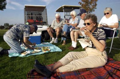 
People enjoy a picnic on the hill in Pavillion Park in Liberty Lake during a Spokane Symphony performance. This is the 10th year for the summer festival. The symphony will perform on Sept. 2 in conjunction with the city's birthday celebration.
 (File / The Spokesman-Review)