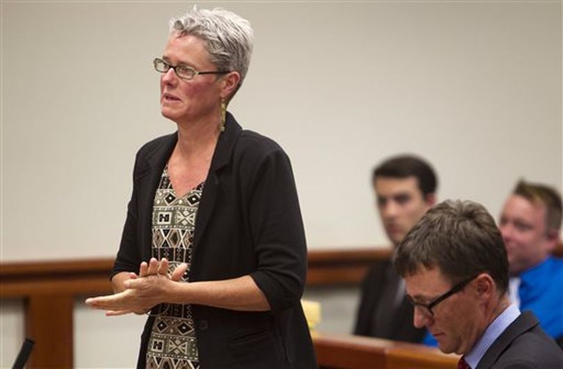 Former state Sen. Nicole LeFavour, Idaho's first openly gay lawmaker, addresses District Judge Michael Oths in the Ada County Courthouse during sentencing for her Add the 4 Words Idaho protest arrest earlier this year, on Monday, July 21, 2014. LeFavour and 22 other defendants pled guilty and were given community service and a fine. (AP/Idaho Statesman / Kyle Green)