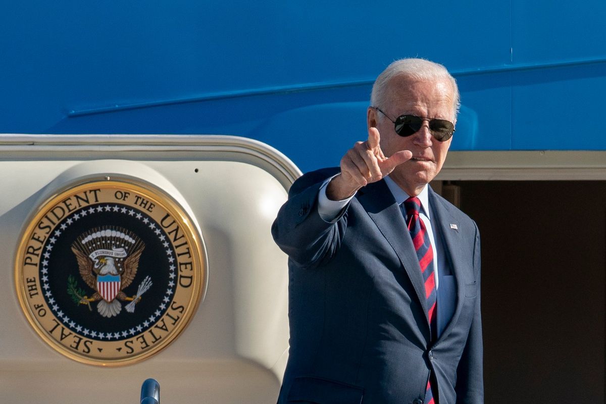 President Joe Biden gestures as he boards Air Force One for a trip to New Hampshire to promote his economic agenda, Tuesday, Nov. 16, 2021, at Andrews Air Force Base, Md.  (Gemunu Amarasinghe)