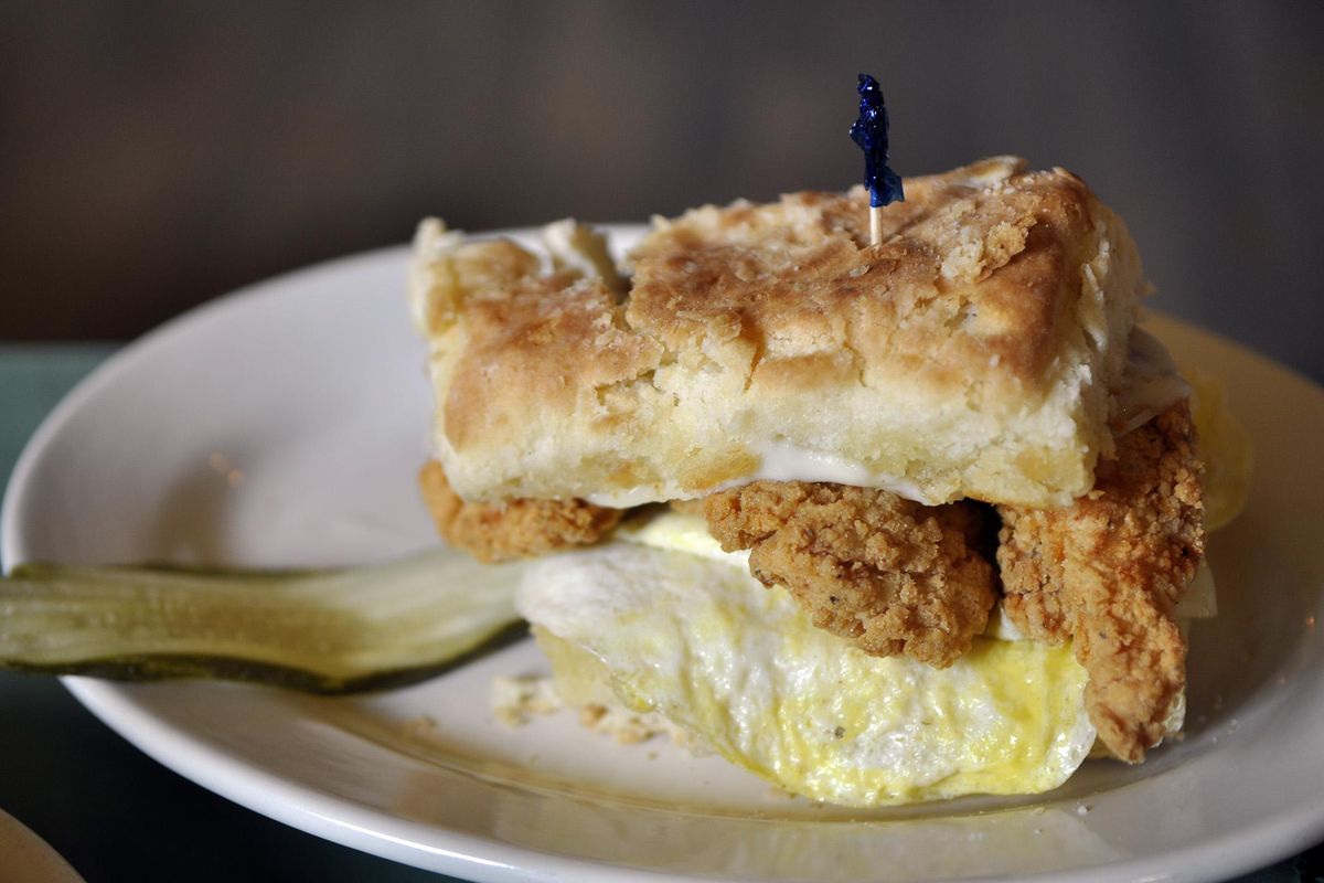 The fried chicken breakfast sandwich at Lefevre Street Bakery in Medical Lake comes on an oversized scratch-made biscuit with egg and cheese. (Adriana Janovich / The Spokesman-Review)