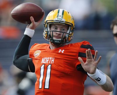 North Dakota State quarterback Carson Wentz is climbing up the draft charts with his big hands. (Brynn Anderson / Associated Press)
