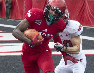 Eastern’s Nzuzi Webster, with the ball, said he and the other defensive backs are fresh heading into the playoffs. (Dan Pelle / The Spokesman-Review)