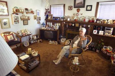 
Cook's strawberry collectibles have taken over the living room in her South Hill home.
 (The Spokesman-Review)