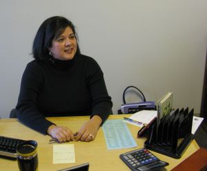 Carmen Achabal, an Idaho Department of Labor employee who's organizing citizen responses for the state's Division of Financial Management, discusses the 217 received so far to Gov. Butch Otter's call for money-saving ideas as he contemplates state budget cuts. (Betsy Russell)