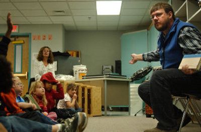 
Local author Terry Bain discusses the way he comes up with ideas with first- and second-graders at Orchard Center Elementary Wednesday.
 (Liz Kishimoto photos/ / The Spokesman-Review)