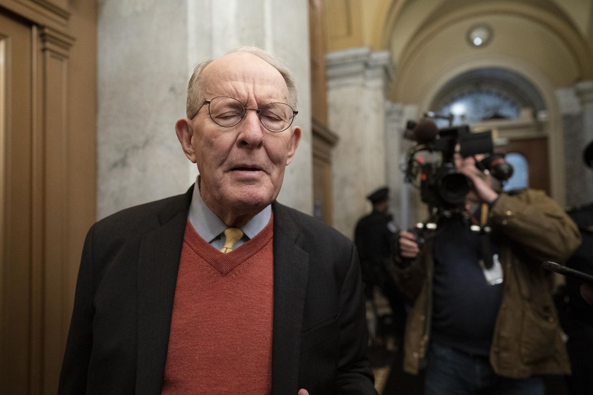 Republican Sen. Lamar Alexander of Tennessee, talks to reporters as he arrives at the Capitol for the impeachment trial of President Donald Trump on charges of abuse of power and obstruction of Congress, in Washington, Friday, Jan. 31, 2020. (J. Scott Applewhite / Associated Press)