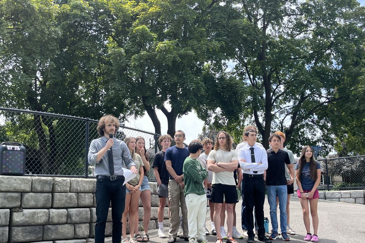 Matthew Mastronardi, left, is pictured on June 16, 2025, with a group of West Valley students at an event discussing his decision to read the "N-Word" in the book "To Kill a Mockingbird" in his Spanish class in April. (Elena Perry)