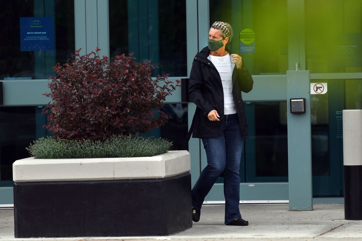 Karen Ryden wears a mask as she leaves the Spokane Valley Mall on May 26, 2020.  (Kathy Plonka)