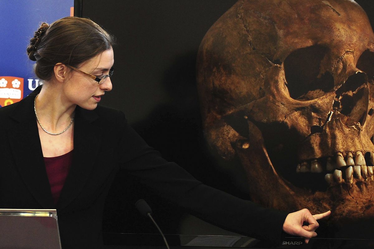 Jo Appleby, a lecturer in Human Bioarchaeology, at University of Leicester, School of Archaeology and Ancient History, who led the exhumation of the remains found during a dig at a Leicester car park, speaks at the university Monday Feb. 4, 2013. Tests have established that a skeleton found , including this skull, are "beyond reasonable doubt" the long lost remains of England