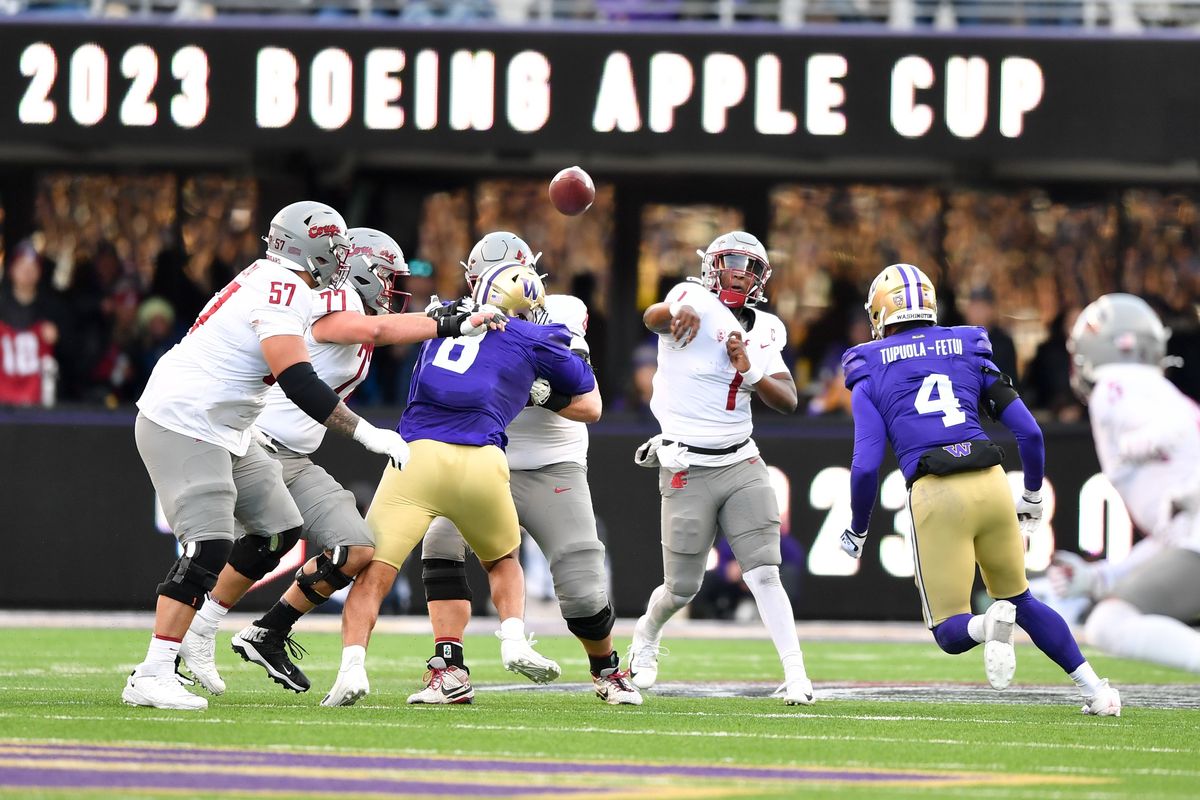 Washington State quarterback Cameron Ward completed 32 of 48 passes for 317 yards against Washington during Saturday’s Apple Cup in Seattle.  (Tyler Tjomsland/The Spokesman-Review)