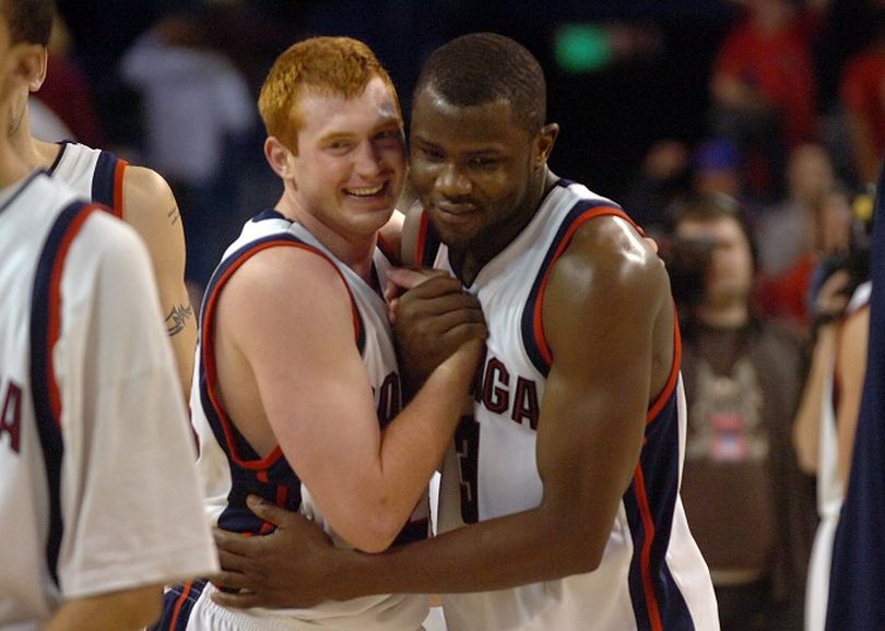 Gonzaga's David Pendergraft, left, celebrates with teammate Abdullahi Kuso after the game Saturday, Mar. 2, 2008 as the Gonzaga Bulldogs faced WCC opponent St. Mary's at the McCarthey Athletic Center in Spokane. Gonzaga won, 88-76.   JESSE TINSLEY THE SPOKESMAN-REVIEW (Jesse Tinsley / The Spokesman-Review)