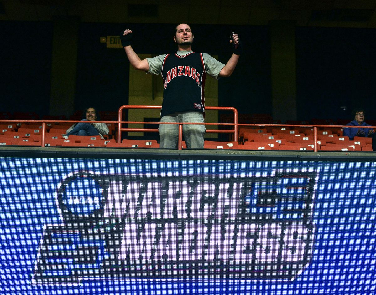 Gonzaga fan Taylor Schwindt cheers on the Zags in his Adam Morrison jersey during practice on Wednesday, March 14, 2018 at Taco Bell Arena in Boise, Idaho. (Dan Pelle / The Spokesman-Review)