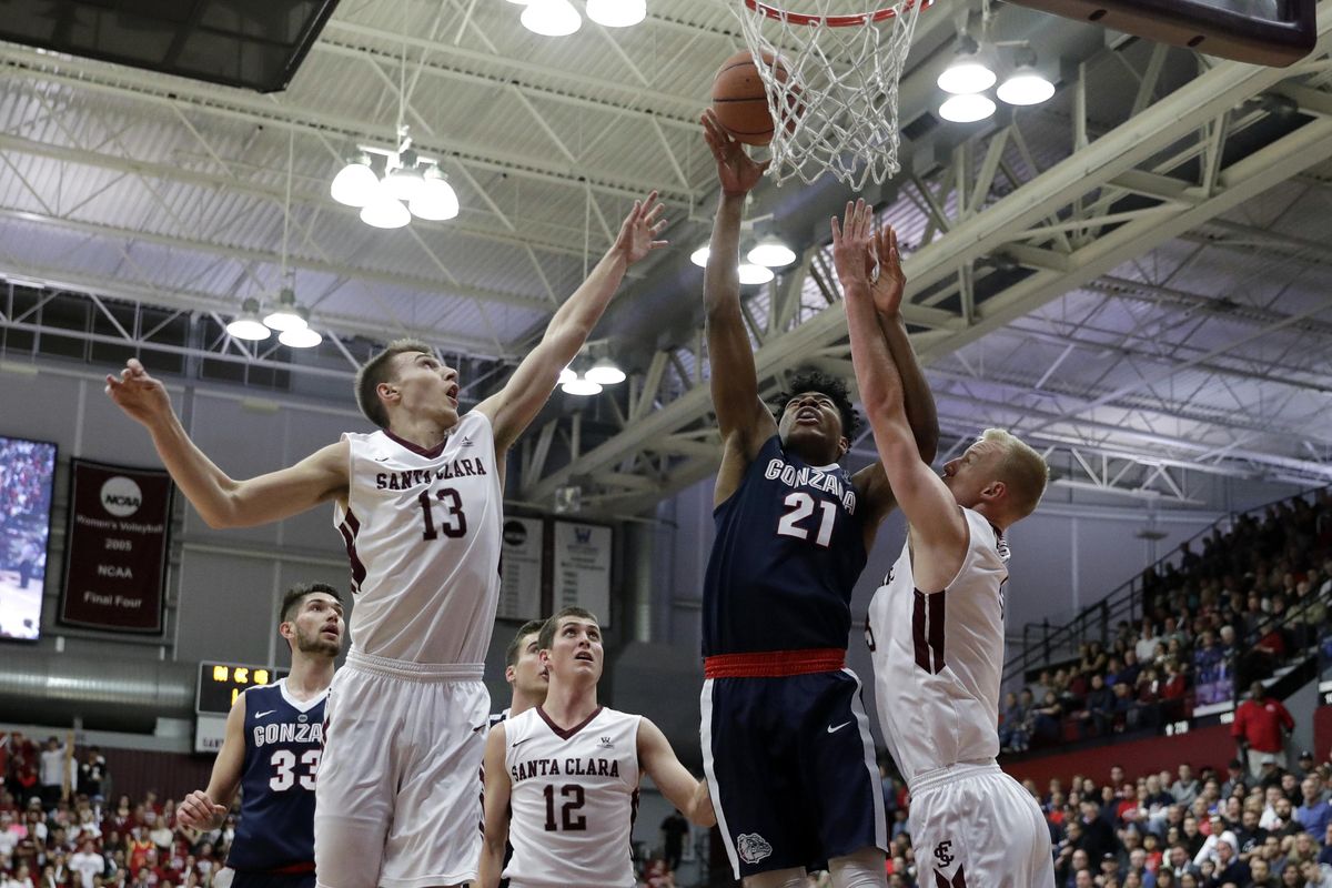 Gonzaga forward Rui Hachimura (21) drives between Santa Clara forward Josip Vrankic (13) and forward Henrik Jadersten, right, during the first half of an NCAA college basketball game Saturday, Jan. 20, 2018, in Santa Clara, Calif. (Marcio Jose Sanchez / Associated Press)