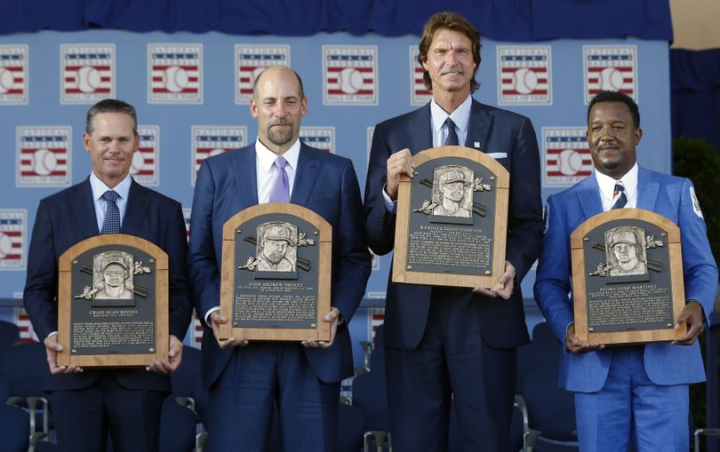 Newly inducted National Baseball Hall of Famers from left, Craig Biggio, John Smoltz, Randy Johnson and Pedro Martinez. (Associated Press)
