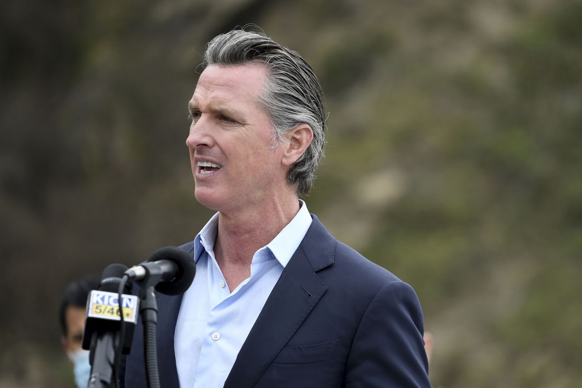 FILE - In this April 23, 2021, file photo, California Gov. Gavin Newsom speaks during a press conference about the newly reopened Highway 1 at Rat Creek near Big Sur, Calif. Organizers of the recall effort against Gov. Newsom collected enough valid signatures to qualify for the ballot. The California secretary of state’s office announced Monday, April 26, 2021 that more than 1.6 million signatures had been verified, about 100,000 more than needed to force a vote on the first-term Democrat.  (Nic Coury)