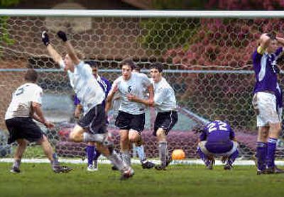 
LC's David Graham (15) and teammates celebrate the winning goal in over Pasco in the second OT. LC's David Graham (15) and teammates celebrate the winning goal in over Pasco in the second OT. 
 (Christopher Anderson/Christopher Anderson/ / The Spokesman-Review)