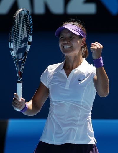 China's Li Na celebrates after defeating Russia's Maria Sharapova in their semifinal match at the Australian Open tennis (Associated Press)