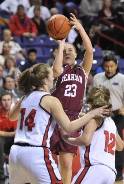 A play from the Reardan High School Indians is pictured in this March 3, 2012 file photo. The district would have to change its name under a new state proposal to bar schools from using Native American references for their mascots.   (JESSE TINSLEY)