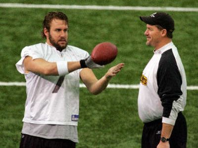 
QB Ben Roethlisberger, left, works with offensive coordinator Ken Whisenhunt, a contender for the head coaching job.
 (Associated Press / The Spokesman-Review)