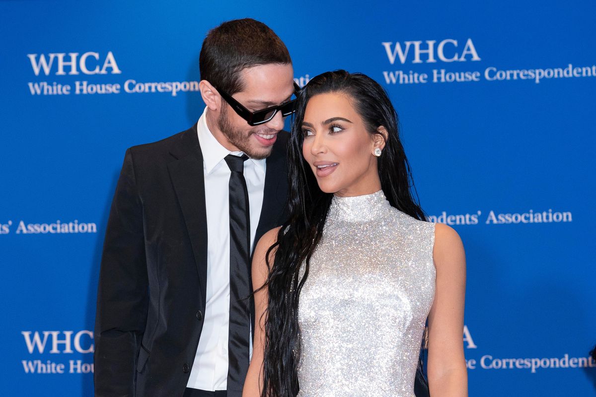 Kim Kardashian and Pete Davidson pose for photographers as they arrive at the annual White House Correspondents