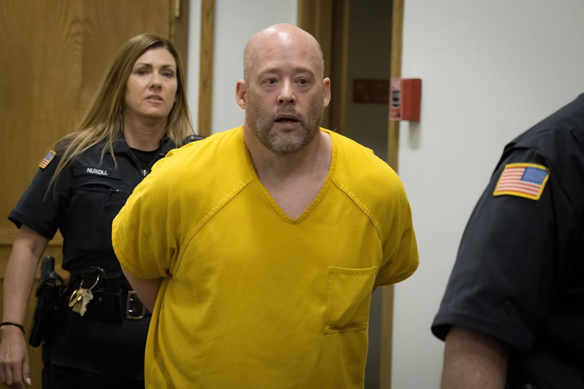 Christopher Blystone arrives at his resentencing in Spokane County Superior Court on Friday.  (COLIN MULVANY/THE SPOKESMAN-REVI)